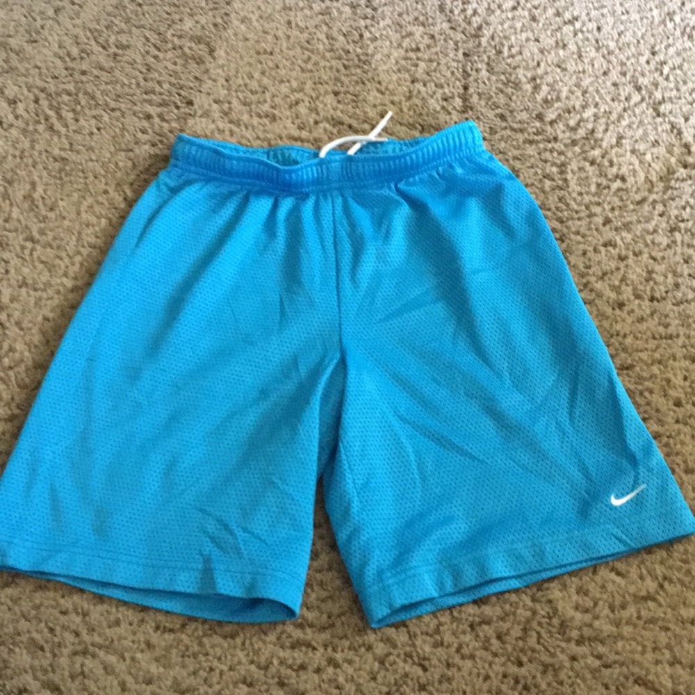 Nike girls blue athletic shorts Sz Medium (10-12)